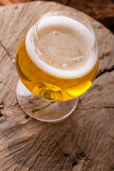 Light beer on stump