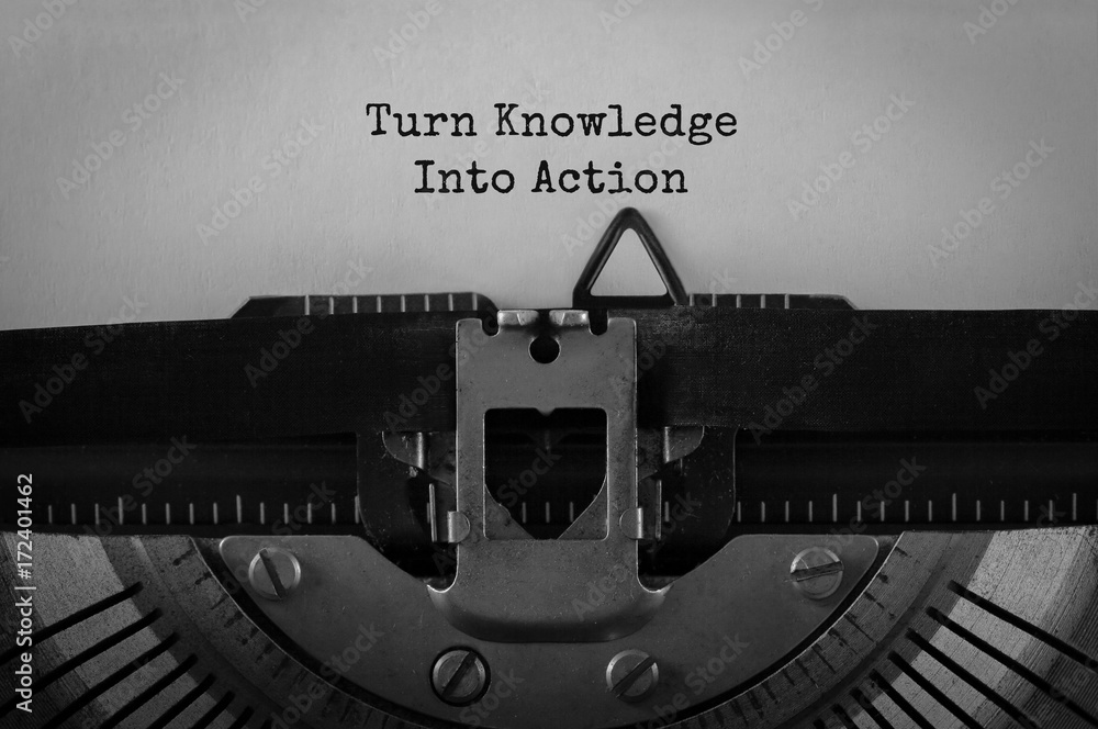 Poster text turn knowledge into action typed on retro typewriter