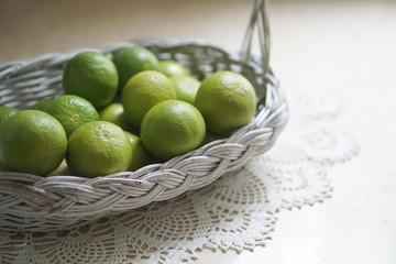 Close Up Lime in a White Basket