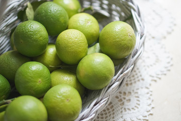 Close Up Lime in a White Basket