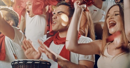 Fans cheering for sports team