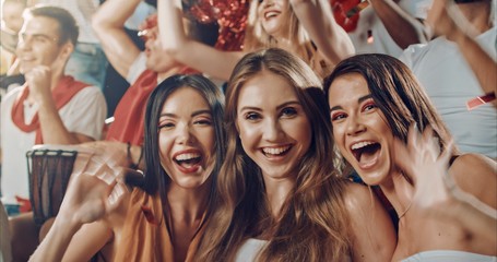 Fans cheering for sports team