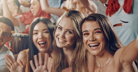 Fans cheering for sports team