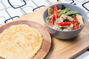 Beef green curry served with roti
