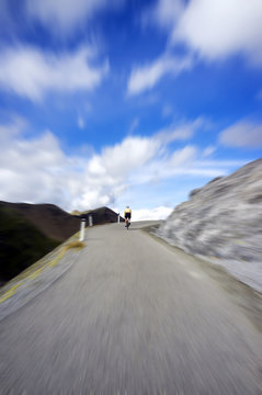 Biking over Stelvio pass. Color image