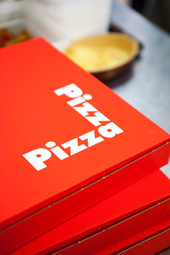 Close-up of stack pizza boxes