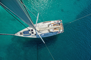 Fototapeta premium View from high angle of sailing boat. Aerial photography of ship deck