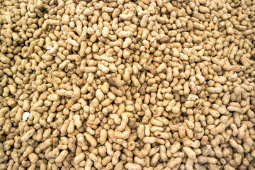 Food background with ripe peanuts