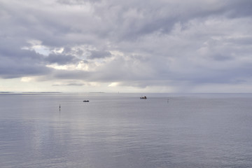 Rendezvous of two boats at calm sea.