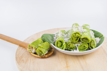 Malaysian traditional cake (Dadar gulung or Ketayap) made from flour, coconut steeped,palm sugar and pandanus flavors