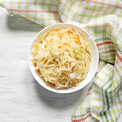 Sauerkraut in a white bowl. The view from the top
