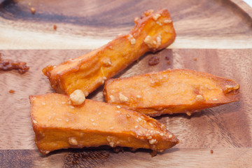 deep-fried sliced sweet potato on white background