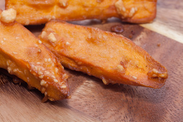 deep-fried sliced sweet potato on white background