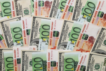 Fototapeta na wymiar Mix of Russian rubles, US dollars and euros