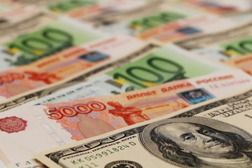 Obraz na płótnie Canvas Mix of Russian rubles, US dollars and euros