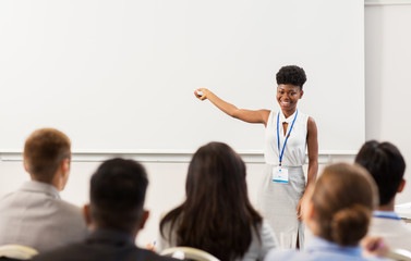 group of people at business conference or lecture