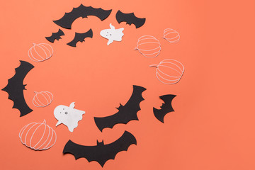 Frame of haloween symbols on red background for logo and text