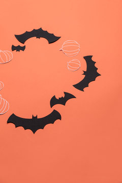 Frame of haloween symbols on red background for logo and text