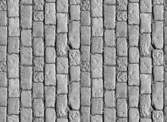 Stone pavement texture. Granite cobblestoned pavement background. Abstract background of old cobblestone pavement close-up. Seamless texture. Perfect tiled on all sides - Powered by Adobe