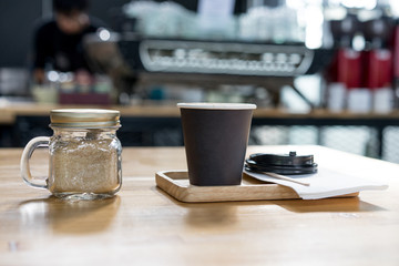 Working in coffee shop.