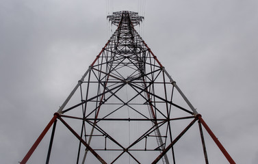 Power tower and cloudy sky