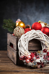 Christmas ornaments in a wooden crate