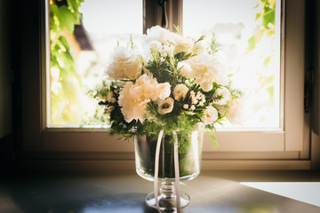 Floral composition in glass vase