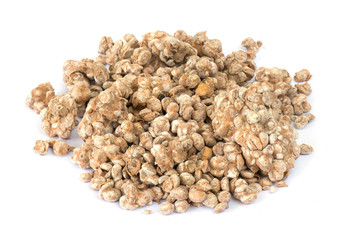 Expired soybean on white paper..Keeping for so long time, soybean seed is rotten and bad smell.