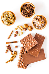 Ingredients for chocolates on white background top view