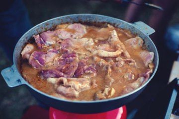 meat in a frying pan