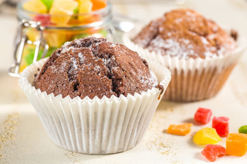 chocolate muffins in paper cupcake holder