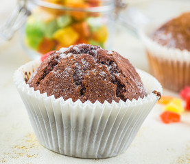 chocolate muffins in paper cupcake holder