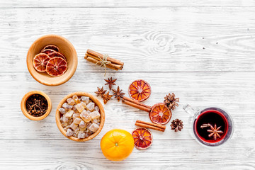 Celebrate new year winter evening with hot drink. Mulled wine or grog ingredients. White background top view. Space for text