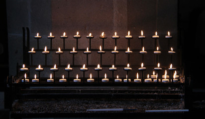 Prayer Candles Lit in a Quiet Part of a Church.