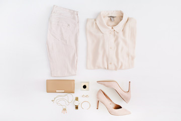Women modern fashion clothes and accessories. Flat lay female casual style look. Top view.