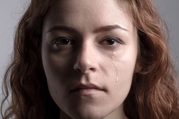 Portrait of a Redhead Crying Woman