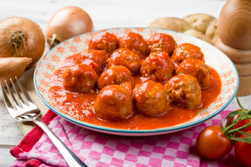 closeup of meatballs in tomato sauce 