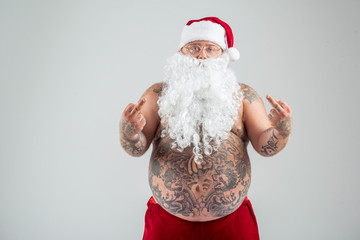 Man in Santa costume gesturing negatively