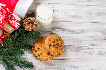 glass of milk and cookies with chocolate for Santa