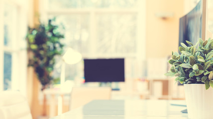 Bright interior workstation with desk and office equipment