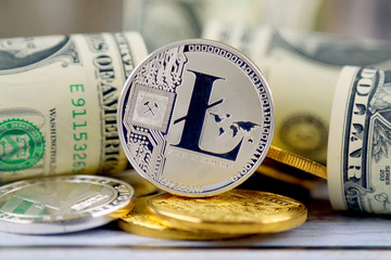 Physical version of Litecoin (new virtual money) and banknotes of one dollar. Exchange Litecoin for...