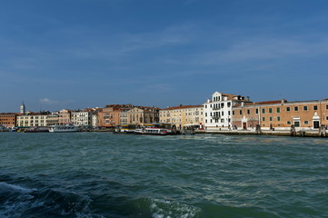 Fototapeta na wymiar View from the sea at the residential district of waterside with port in Venezia, Venice, Italy, Europe