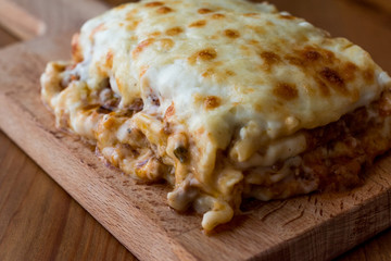 Lasagna with minced meat, Bolognese sauce and melted cheese.