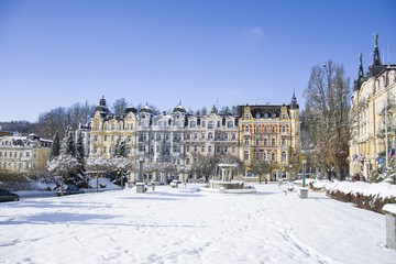 Fototapeta na wymiar Spa architecture in winter with snow - Marianske Lazne (Marienbad) - great famous Bohemian spa town in the west part of the Czech Republic (region Karlovy Vary)