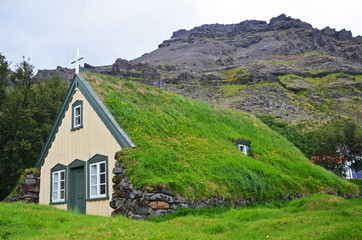 Fototapeta na wymiar Hofskirkja turf church in southeast Iceland