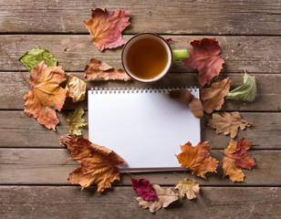 notebook mug of autumn leaves