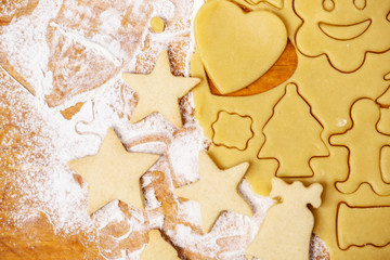cutting out cookies from dough