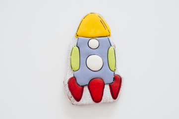 Bright and tasty gingerbread in the form of a rocket. Home cooking.