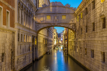 Plakat Bridge of Sighs Ponte dei Sospiri illumitaed at blue hour sunset night in Venice, Italy. Famous landmark.