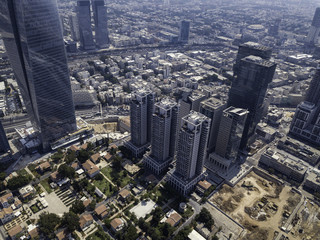 Fototapeta premium TEL AVIV, ISRAEL Cityscape with towers of Azrieli Center and Sarona area in Tel Aviv, . Azrieli center is the main landmark of Tel Aviv. Old and New Architecture in Tel Aviv - Old and modern bui